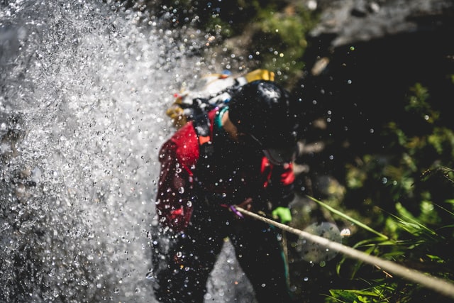 man-climbing-the-waterfall